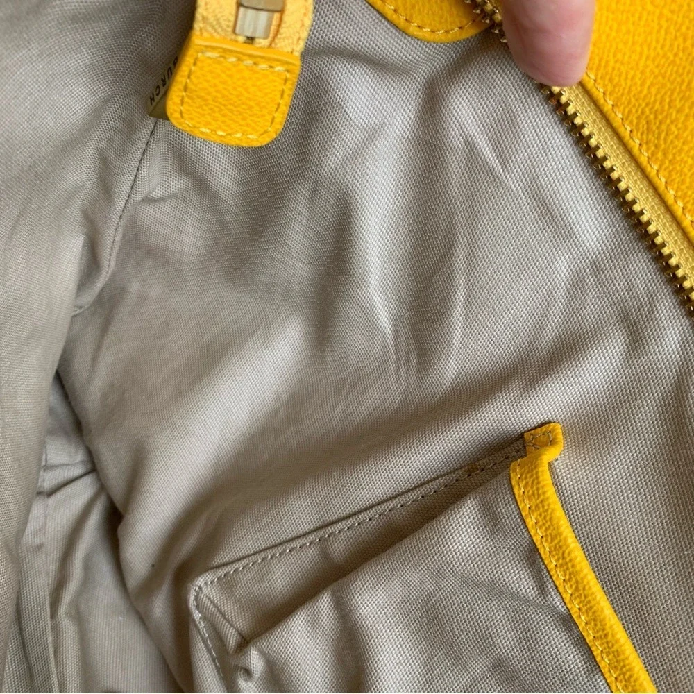 TORY BURCH. Yellow Leather Pebbled Roslyn‎ bag w/ stripes & a Logo accent.